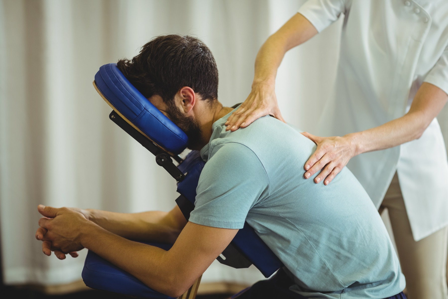 Seated chair massage at a corporate event